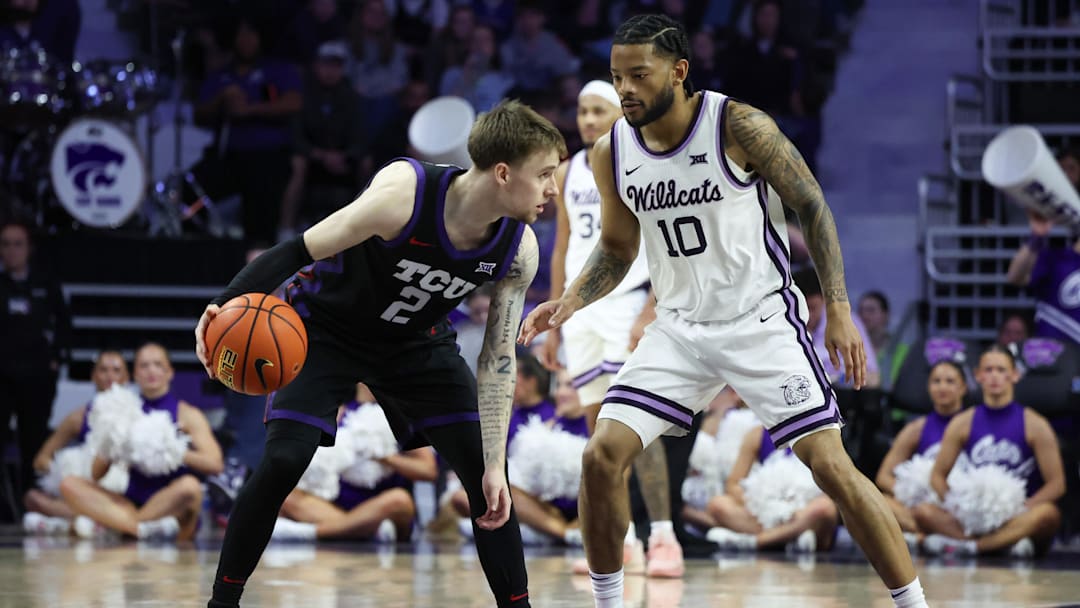 Kansas State guard David Castillo covers TCU guard Brock Harding in second half at Bramlage Coliseum. 