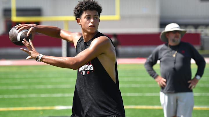 Quarterback Davin Davidson passes the ball during 7-on-7 drills. Cardinal Mooney High football players participate in the school's summer strength and conditioning camp Monday, July 22, 2024. The Cougars won the FHSAA Class 1S state championship last year, defeating Trinity Catholic.