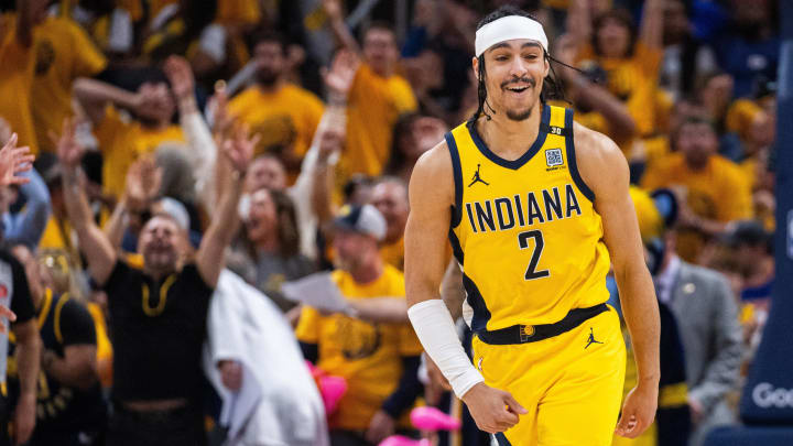 May 17, 2024; Indianapolis, Indiana, USA; Indiana Pacers guard Andrew Nembhard (2) celebrates a made basket  during game six of the second round for the 2024 NBA playoffs against the New York Knicks at Gainbridge Fieldhouse. 