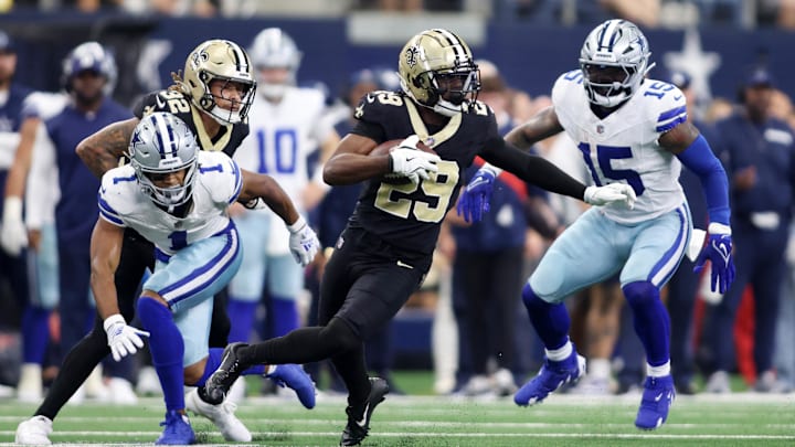 Sep 15, 2024; Arlington, Texas, USA; New Orleans Saints cornerback Paulson Adebo (29) returns an interception against the Dallas Cowboys in the second quarter at AT&T Stadium. Mandatory Credit: Tim Heitman-Imagn Images