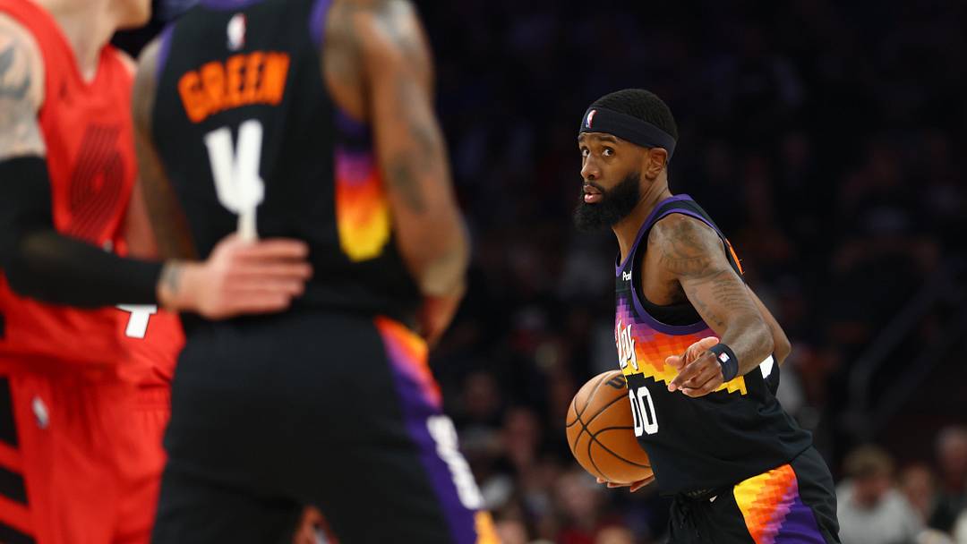 Feb 22, 2026; Phoenix, Arizona, USA; Phoenix Suns forward Royce O'Neale (00) against the Portland Trail Blazers in the first half at Mortgage Matchup Center. Mandatory Credit: Mark J. Rebilas-Imagn Images

