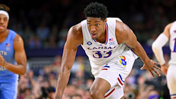 Apr 4, 2022; New Orleans, LA, USA; Kansas Jayhawks forward David McCormack (33) reacts after a play against the North Carolina Tar Heels during the second half during the 2022 NCAA men's basketball tournament Final Four championship game at Caesars Superdome. Mandatory Credit: Bob Donnan-Imagn Images
