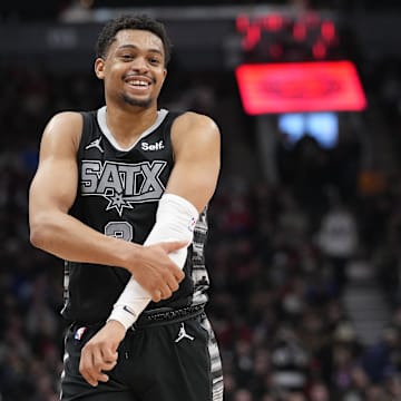 Feb 12, 2024; Toronto, Ontario, CAN; San Antonio Spurs forward Keldon Johnson (3) reacts after a play against the Toronto Raptors during the second half at Scotiabank Arena.