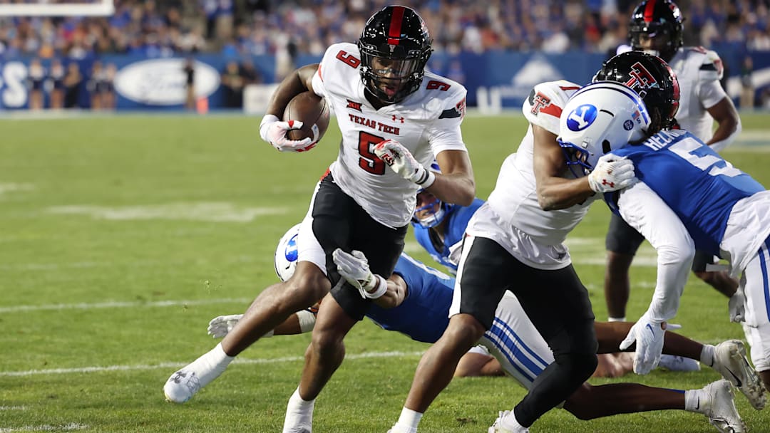 Oct 21, 2023; Provo, Utah, USA; Texas Tech Red Raiders wide receiver Jerand Bradley (9) runs after a catch against the Brigham Young Cougars in the second half at LaVell Edwards Stadium. Mandatory Credit: Rob Gray-Imagn Images