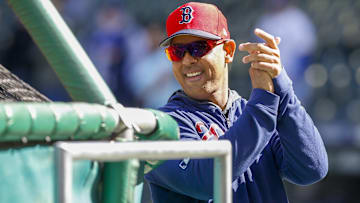 Boston Red Sox manager Alex Cora (20) reacts during batting practice against the Seattle Mariners at T-Mobile Park.