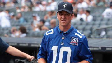 Aug 4, 2024; Bronx, New York, USA; New York Giants former quarterback Eli Manning prepares to throw out the first pitch before the game between the New York Yankees and the Toronto Blue Jays at Yankee Stadium. Mandatory Credit: Vincent Carchietta-USA TODAY Sports