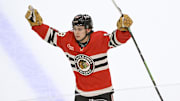 Mar 7, 2025; Chicago, Illinois, USA;   Chicago Blackhawks center Connor Bedard (98) celebrates after scoring the winning goal during the overtime period  at the United Center. Mandatory Credit: Matt Marton-Imagn Images