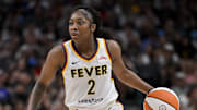 Aug 1, 2025; Dallas, Texas, USA; Indiana Fever guard Aari McDonald (2) in action during the game between the Dallas Wings and the Indiana Fever at the American Airlines Center. Mandatory Credit: Jerome Miron-Imagn Images