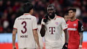 Dayot Upamecano mit Min-jae Kim (l.)