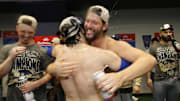 Oct 31, 2025; Toronto, Ontario, CAN; Los Angeles Dodgers pitcher Clayton Kershaw (22) and first baseman Enrique Hernandez (8) celebrate after defeating the Toronto Blue Jays in the 2025 MLB World Series at Rogers Centre. Mandatory Credit: John E. Sokolowski-Imagn Images