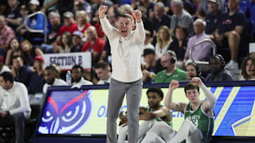 Jan 28, 2024; Boca Raton, Florida, USA; North Texas Mean Green head coach Ross Hodge reacts from the sideline against the Florida Atlantic Owls during the first half at Eleanor R. Baldwin Arena. Mandatory Credit: Sam Navarro-Imagn Images