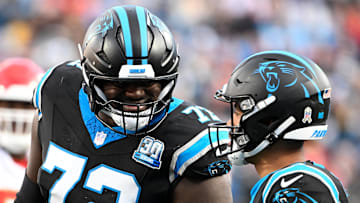 Taylor Moton and Bryce Young