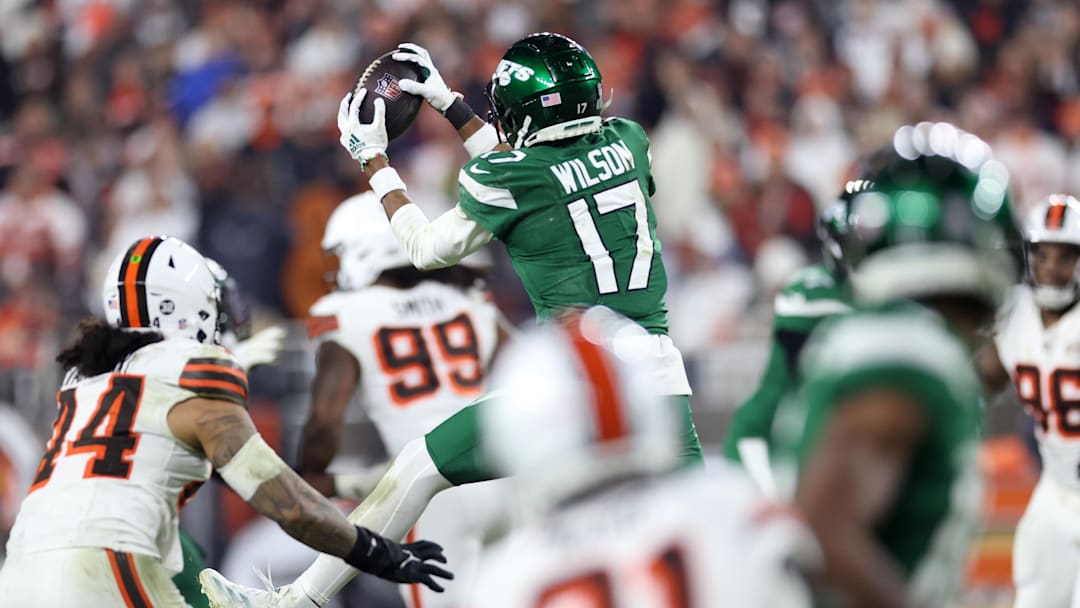 Dec 28, 2023; Cleveland, Ohio, USA; New York Jets wide receiver Garrett Wilson (17) makes a catch during the second half against the Cleveland Browns at Cleveland Browns Stadium. Mandatory Credit: Scott Galvin-Imagn Images