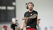 Ohio State Buckeyes offensive coordinator Brian Hartline motions during spring football practice at the Woody Hayes Athletic Center in Columbus on March 19, 2025.