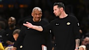 Apr 11, 2025; Los Angeles, California, USA; Los Angeles Lakers head coach JJ Redick reacts against the Houston Rockets during the first half at Crypto.com Arena. Mandatory Credit: Jonathan Hui-Imagn Images