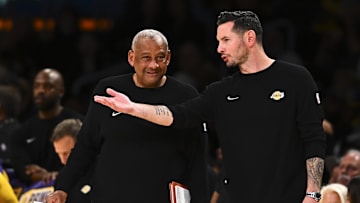 Apr 11, 2025; Los Angeles, California, USA; Los Angeles Lakers head coach JJ Redick reacts against the Houston Rockets during the first half at Crypto.com Arena. Mandatory Credit: Jonathan Hui-Imagn Images