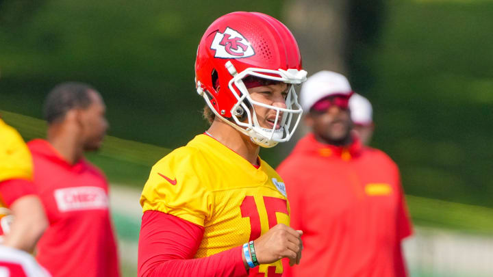 Jul 22, 2024; St. Joseph, MO, USA; Kansas City Chiefs quarterback Patrick Mahomes (15) looks over the defense during training camp at Missouri Western State University. Mandatory Credit: Denny Medley-USA TODAY Sports