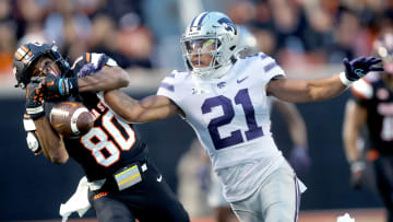 Kansas State's Marques Sigle (21) breaks up a pass intended for Oklahoma State's Brennan Presley (80) in the first half of the college football game between the Oklahoma State University Cowboys and the Kansas State Wildcats at Boone Pickens Stadium in Stillwater. Okla., Friday, Oct. 6, 2023. OSU won 29-21.