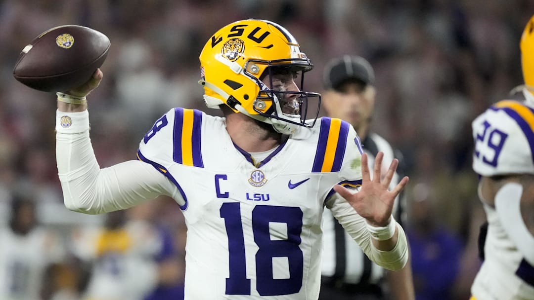 Nov 8, 2025; Tuscaloosa, Alabama, USA;  LSU quarterback Garrett Nussmeier (18) throws a pass during the second half of the game with Alabama at Saban Field at Bryant-Denny Stadium. Alabama defeated LSU 20-9. Mandatory Credit: Gary Cosby Jr.-Imagn Images