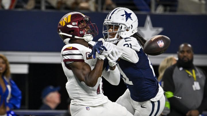 Nov 23, 2023; Arlington, Texas, USA; Dallas Cowboys cornerback Stephon Gilmore (21) breaks up a pass intended for Washington Commanders wide receiver Terry McLaurin (17) during the second half at AT&T Stadium.