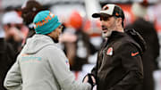 Dec 29, 2024; Cleveland, Ohio, USA; Cleveland Browns head coach Kevin Stefanski, right, shakes hands with Miami Dolphins head coach Mike McDaniel before the game at Huntington Bank Field. Mandatory Credit: Ken Blaze-Imagn Images