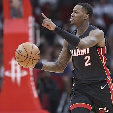 Apr 5, 2024; Houston, Texas, USA; Miami Heat guard Terry Rozier (2) brings the ball up the court during the third quarter against the Houston Rockets at Toyota Center. Mandatory Credit: Troy Taormina-Imagn Images