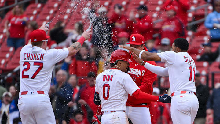 Apr 1, 2026; St. Louis, Missouri, USA; St. Louis Cardinals shortstop Masyn Winn (0) is mobbed by teammates after hitting a walk-off one run single against the New York Mets during the eleventh inning at Busch Stadium. Mandatory Credit: Jeff Curry-Imagn Images