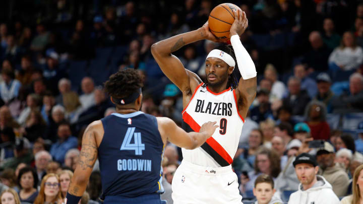 Mar 1, 2024; Memphis, Tennessee, USA; Portland Trail Blazers forward Jerami Grant (9) handles the ball as Memphis Grizzlies guard Jordan Goodwin(4) defends during the first half at FedExForum. Mandatory Credit: Petre Thomas-USA TODAY Sports