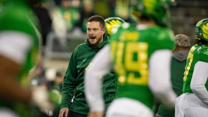 Oregon head coach Dan Lanning calls to his team during warm-ups as the No. 6 Oregon Ducks take on the No. 16 Oregon State Beavers Friday, Nov. 24, 2023, at Autzen Stadium in Eugene, Ore.