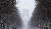 Snow falls on the Golden Dome, University of Notre Dame's Main Building, on Thursday, Feb. 20, 2025, in South Bend.