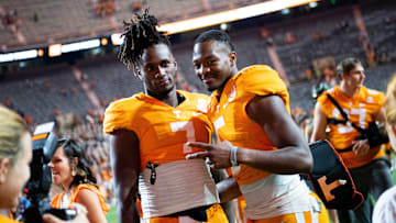 Tennessee quarterbacks Joe Milton III (7) and Hendon Hooker (5) after Tennessee's football game against Akron in Neyland Stadium in Knoxville, Tenn., on Saturday, Sept. 17, 2022.