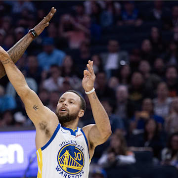 Oct 17, 2025; San Francisco, California, USA; Golden State Warriors guard Stephen Curry (30) is fouled by Los Angeles Clippers forward Derrick Jones Jr. (5) as he shoots during the first quarter at Chase Center. Mandatory Credit: D. Ross Cameron-Imagn Images