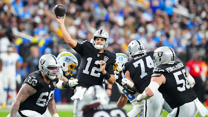 Jan 5, 2025; Paradise, Nevada, USA; Las Vegas Raiders quarterback Aidan O'Connell (12) makes a pass attempt against the Los Angeles Chargers during the fourth quarter at Allegiant Stadium. Mandatory Credit: Stephen R. Sylvanie-Imagn Images Jan 5, 2025; Paradise, Nevada, USA; Las Vegas Raiders quarterback Aidan O'Connell (12) makes a pass attempt against the Los Angeles Chargers during the fourth quarter at Allegiant Stadium. Mandatory Credit: Stephen R. Sylvanie-Imagn Images