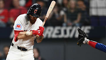 Sep 27, 2025; Cleveland, Ohio, USA; Cleveland Guardians first baseman CJ Kayfus (63) is hit by a pitch with the bases loaded to win the game against the Texas Rangers during the ninth inning at Progressive Field. 