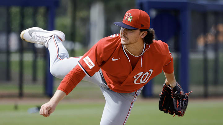 Feb 19, 2026; West Palm Beach, FL, USA;  Washington Nationals pitcher Riley Cornelio (74) throws a pitch during spring training workouts at CACTI Park of the Palm Beaches. Mandatory Credit: Reinhold Matay-Imagn Images