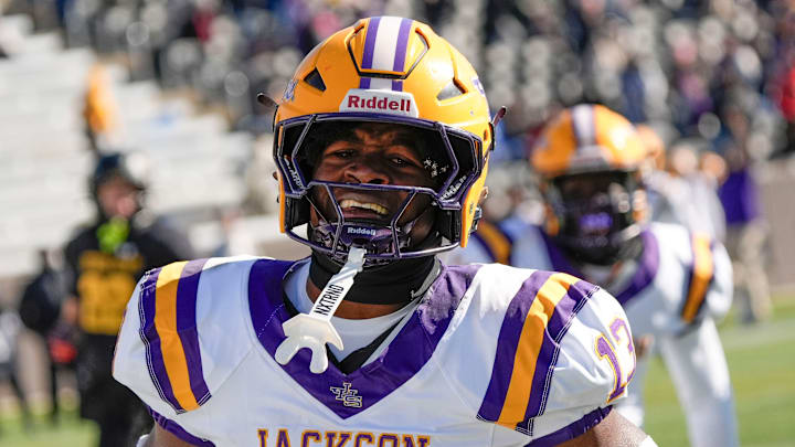 Dec 6, 2024; Birmingham, AL, USA; Jackson's Ezavier Crowell (13) breaks a long touchdown run on the Aggie’s first possession against Cherokee County at Protective Stadium in the AHSAA 4A State Championship gam Dec 6, 2024; Birmingham, AL, USA; Jackson's Ezavier Crowell (13) breaks a long touchdown run on the Aggie’s first possession against Cherokee County at Protective Stadium in the AHSAA 4A State Championship gam