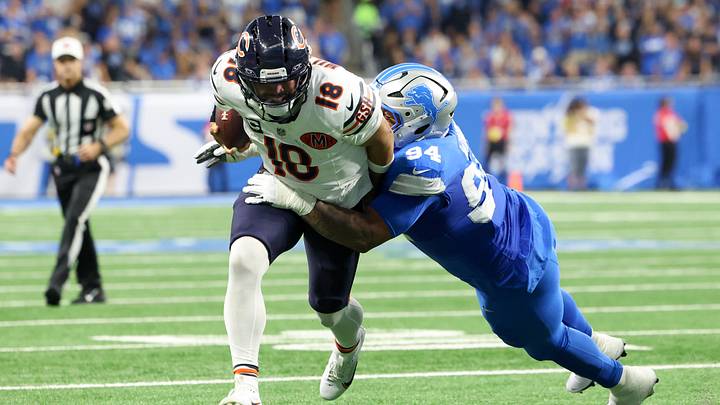 Sep 14, 2025; Detroit, Michigan, USA; Detroit Lions defensive tackle Mekhi Wingo (94) tackles Chicago Bears quarterback Caleb Williams (18) during the second quarter of the game at Ford Field. Mandatory Credit: David Reginek-Imagn Images