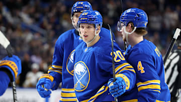 Mar 27, 2025; Buffalo, New York, USA;  Buffalo Sabres center Jiri Kulich (20) celebrates his goal with teammates during the second period against the Pittsburgh Penguins at KeyBank Center. Mandatory Credit: Timothy T. Ludwig-Imagn Images