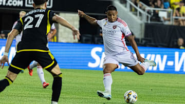 Sep 21, 2024; Columbus, Ohio, USA; Orlando City forward Luis Muriel (9) shoots the ball on goal while  Columbus Crew forward Max Arftsen (27) defends in the second half at Lower.com Field. Mandatory Credit: Trevor Ruszkowski-Imagn Images