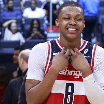 Apr 13, 2025; Miami, Florida, USA; Washington Wizards guard Bub Carrington (8) reacts after the Wizards win against the Miami Heat at Kaseya Center. Mandatory Credit: Rhona Wise-Imagn Images