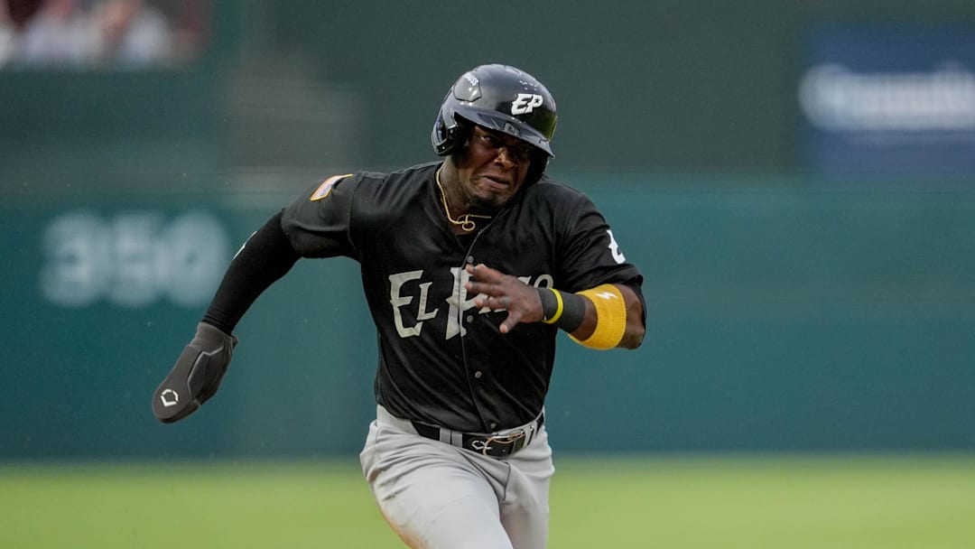 El Paso infielder Yonathan Perlaza (5) attempts to steal home during the home opener Minor League baseball game between the Oklahoma City Comets and the El Paso Chihuahuas at Chickasaw Bricktown Ballpark in Oklahoma City on Tuesday, April 1, 2025.