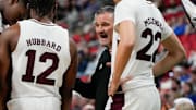 Mississippi State Bulldogs head coach Chris Jans speaks to his players during the first half against the Baylor Bears in the first round of the NCAA Tournament at Lenovo Center.