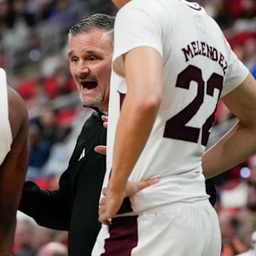 Mississippi State Bulldogs head coach Chris Jans speaks to his players during the first half against the Baylor Bears in the first round of the NCAA Tournament at Lenovo Center.