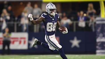 Dec 30, 2023; Arlington, Texas, USA; Dallas Cowboys wide receiver CeeDee Lamb (88) runs the ball in the second half against the Detroit Lions at AT&T Stadium. Mandatory Credit: Tim Heitman-Imagn Images