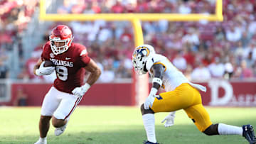Sep 9, 2023; Fayetteville, Arkansas, USA; Arkansas Razorbacks tight end Luke Hasz (9) runs after a catch during the fourth quarter against the Kent State Golden Flashes at Donald W. Reynolds Razorback Stadium. Arkansas won 28-6. Mandatory Credit: Nelson Chenault-Imagn Images