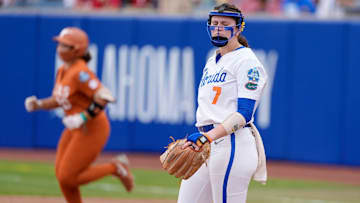 Florida pitcher Keagan Rothrock (7) reacts after giving up a home run to Texas utility Katie Stewart (20) in the sixth inning of a Women's College World Series softball game between the Texas Longhorns and the Florida Gators at Devon Park in Oklahoma City, Thursday, May 29, 2025.