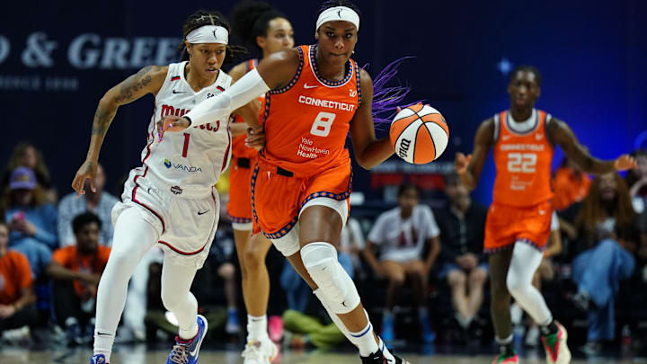 Aug 21, 2025; Uncasville, Connecticut, USA; Connecticut Sun forward Aaliyah Edwards (8) drives the ball against Washington Mystics guard Sug Sutton (1) in the second half at Mohegan Sun Arena. David Butler II-Imagn Images Aug 21, 2025; Uncasville, Connecticut, USA; Connecticut Sun forward Aaliyah Edwards (8) drives the ball against Washington Mystics guard Sug Sutton (1) in the second half at Mohegan Sun Arena. David Butler II-Imagn Images