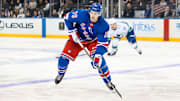 Mar 22, 2025; New York, New York, USA; New York Rangers left wing Brennan Othmann (78) skates against the Vancouver Canucks during the third period at Madison Square Garden. Mandatory Credit: Danny Wild-Imagn Images