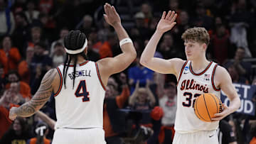 Mar 21, 2025; Milwaukee, WI, USA; Illinois guard Kylan Boswell (4) and Illinois guard Kasparas Jakucionis (32) celebrate their victory over Xavier at the end of their first round NCAA men’ s basketball tournament game at Fiserv Forum. Mandatory Credit: Jovanny Hernandez/USA Today Network via Imagn Images