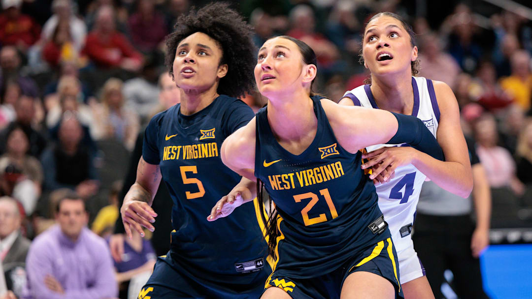 Mar 8, 2026; Kansas City, MO, USA; West Virginia Mountaineers forward Riley Makalusky (21) blocks out during the second half against the TCU Horned Frogs at T-Mobile Center. Mandatory Credit: William Purnell-Imagn Images